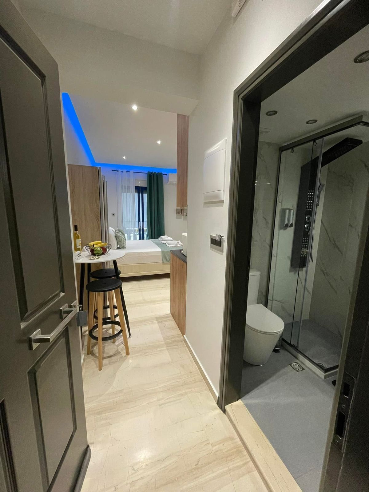 Room One entrance view with private bathroom