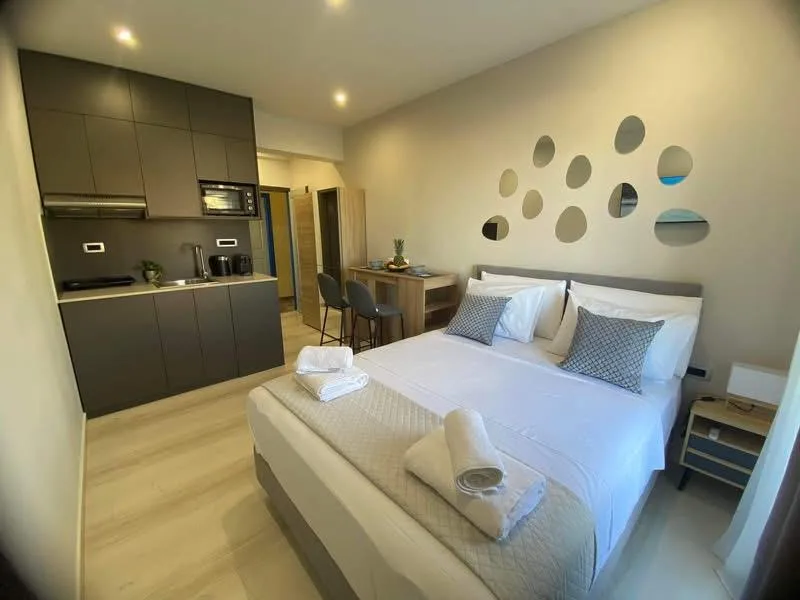 Room Two double bed with kitchenette and modern finishes